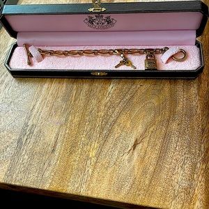 Juicy Couture Lock & Key Charm Bracelet. Gold Tone Link Charm Toggle Bracelet.